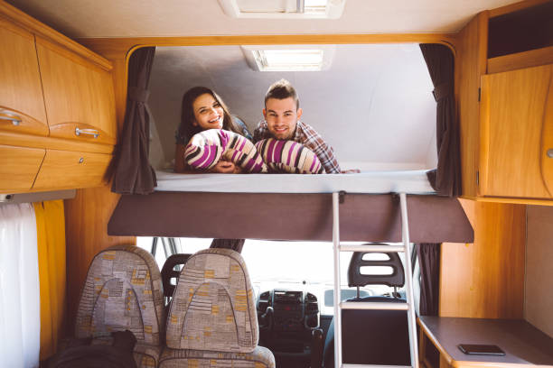 istock Couple travels with campervan 1053599800