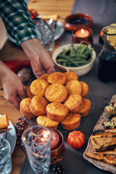 istock Family Having Traditional Holiday Stuffed Turkey Dinner 1053603934