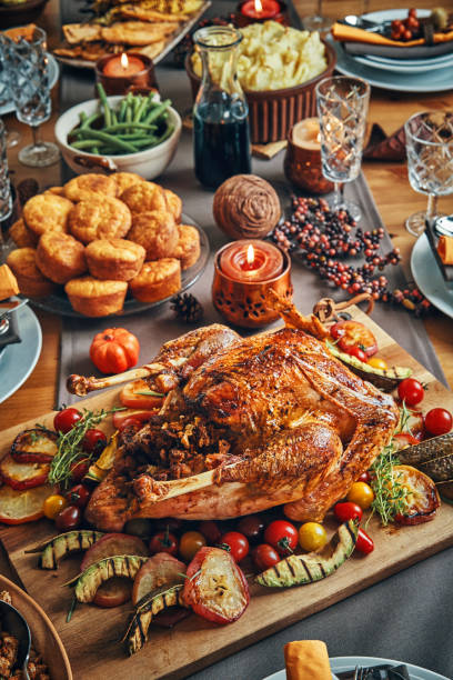 istock Family Having Traditional Holiday Stuffed Turkey Dinner 1053603950