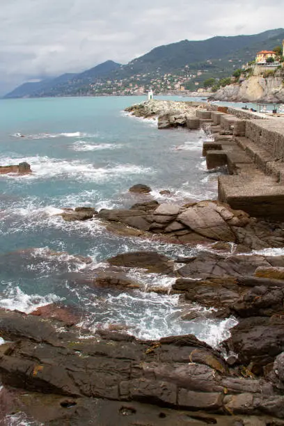 Rocks on the sea in Camogli in a windy sunny day