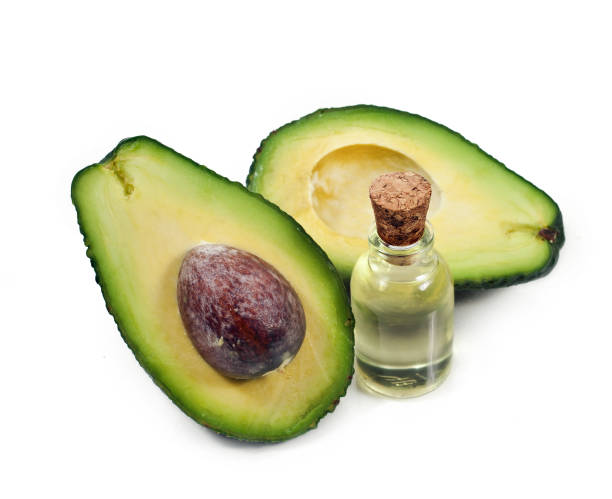 istock Avocado oil and fresh avocado 1053611962