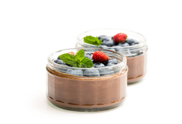 Chocolate  praline mousse with berries isolated on white