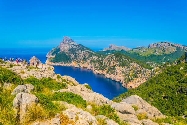 istock People are enjoying view from Es Colomer viewpoint, Mallorca, Spain 1053615366