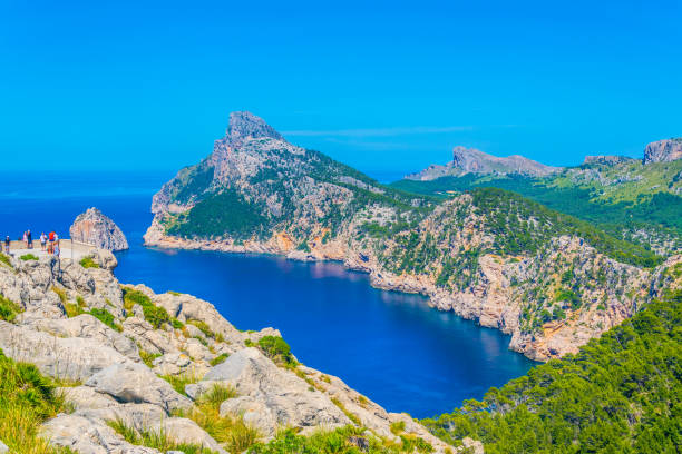 istock People are enjoying view from Es Colomer viewpoint, Mallorca, Spain 1053617024