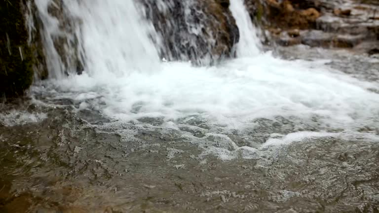 small waterfall like a background, a backdrop or wallpaper.