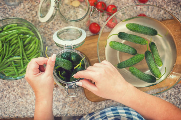 istock Preserving Fresh Organic Vegetables in Jars 1053626890