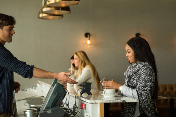 istock Contactless payment by smart phone 1053634046