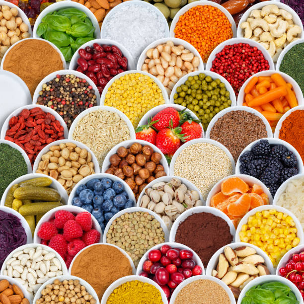 istock Fruits and vegetables spices ingredients background square berries from above 1053636732