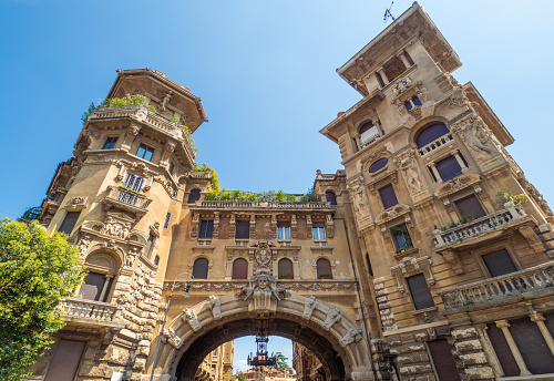 Rome, Italy - 19 August 2018 - The esoteric quarter of Rome, called 'Quartiere Coppedè', designed by architect Gino Coppedè consisting of eighteen palaces and twenty-seven buildings rich in symbologies. Here in particular a view of artistic buildings