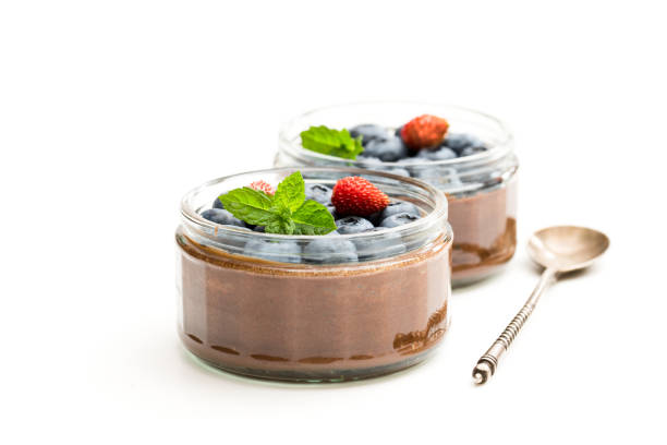 istock Chocolate praline mousse with berries isolated on white 1053642488