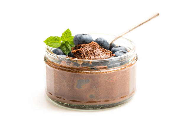 istock Chocolate praline mousse with berries isolated on white 1053642556