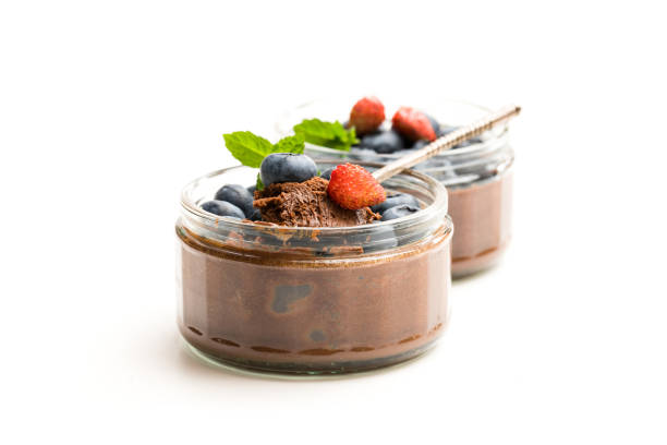 istock Chocolate praline mousse with berries isolated on white 1053642666