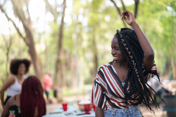 istock Girl Dancing on Picnic Party at Park 1053642936