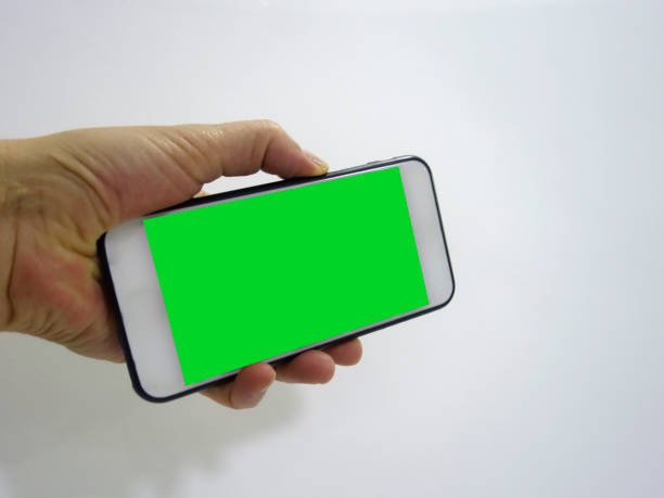 istock there's a phone greenbox.women's hand 1053645568