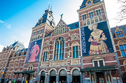 AMSTERDAM, NETHERLANDS - MARCH, 2018: The National Museum located at the Museum Square in Amsterdam