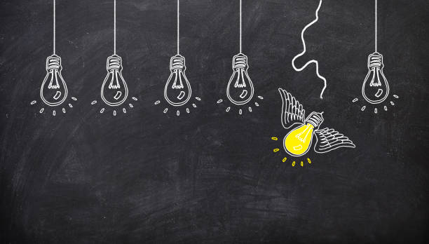 istock brillant lamp breaking the rope and fly. ideo concept 1053661116