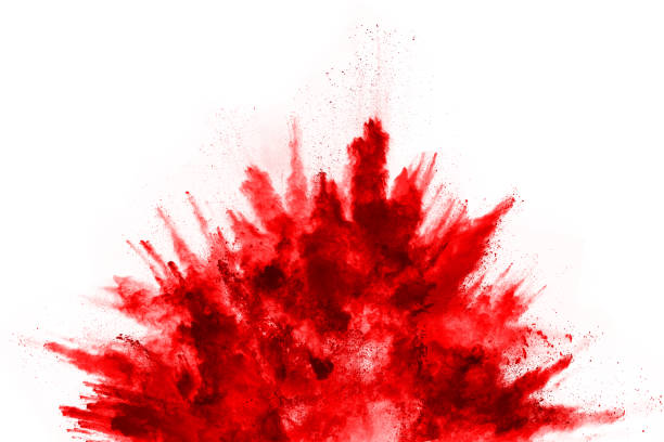 istock Freeze motion of red powder exploding, isolated on white background. Abstract design of red dust cloud. Particles explosion screen saver, wallpaper 1053667294