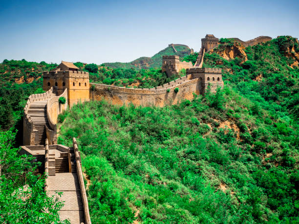 The Great Wall Jinshanling section with green trees in a sunny day, Beijing, China stock photo