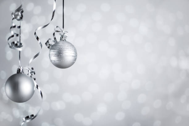 istock Silver Christmas balls with ribbon 1053667602