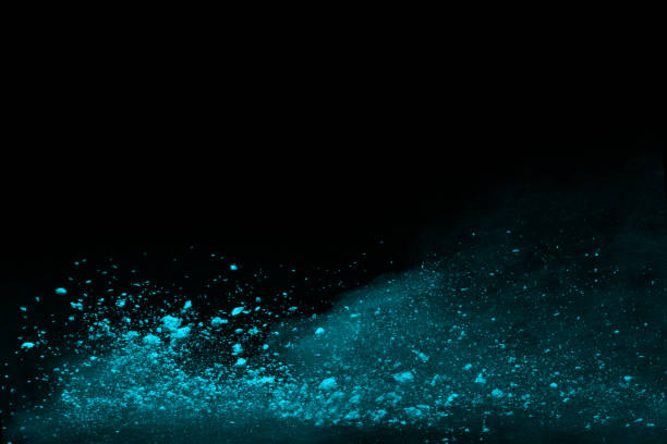 istock Blue powder explosion on black background. Colored cloud. Colorful dust explode. Paint Holi. 1053668688