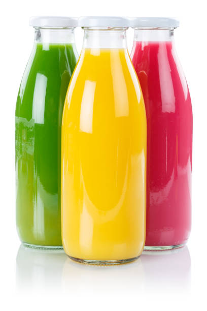 istock Juice smoothie orange fruit fruits smoothies in bottle portrait format 1053689646
