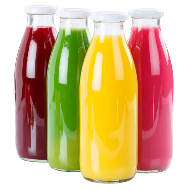 istock Fruit juice in a bottle fresh isolated on white 1053689850