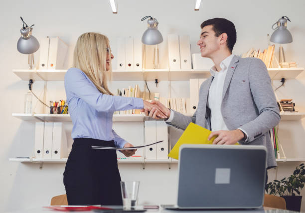 istock Man and woman in the office 1053690132