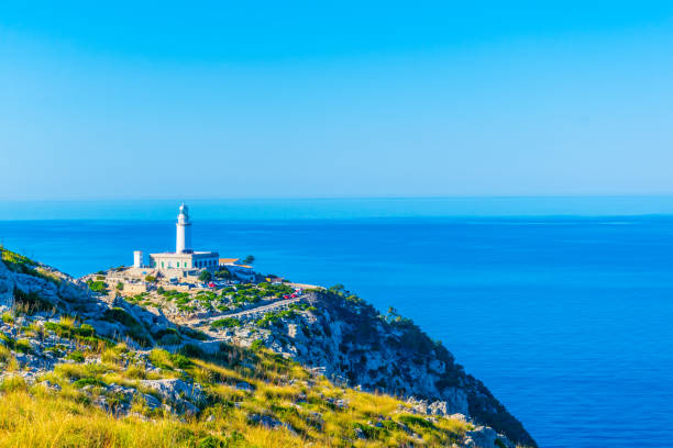 istock Far Formentor lighthouse at Mallorca, Spain 1053698844