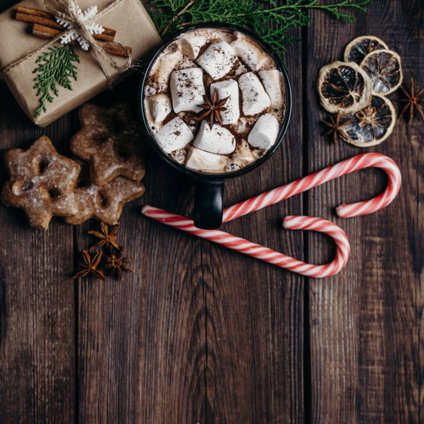 istock Christmas background with hot chocolate and gifts 1053704032
