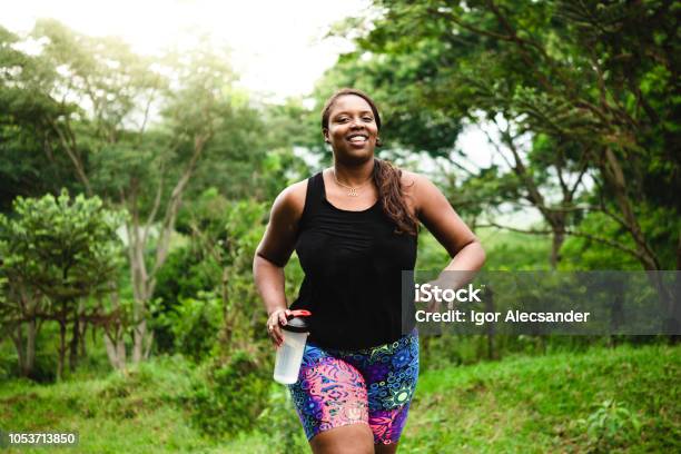 Body Positive Woman Exercising In Nature Stock Photo - Download Image Now - Exercising, One Woman Only, Running