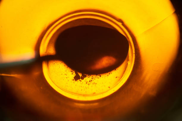 istock Black tea in a transparent cup with a spoon 1053715506