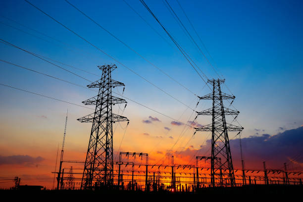 istock Electric tower, silhouette at sunset 1053721820