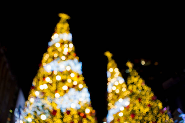 istock Beautiful Bokeh of Christmas tree Decoration Light on Black Background 1053725626