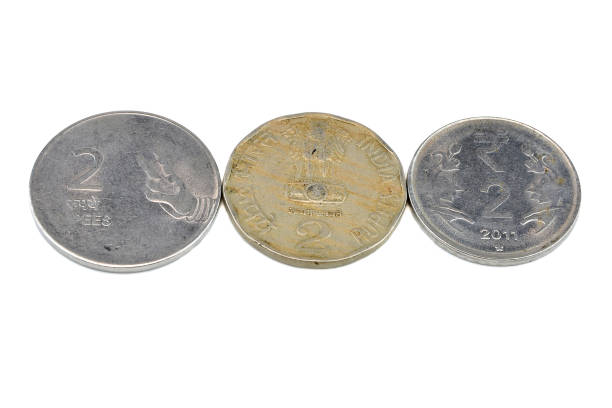 istock Three Indian metal coins on an isolated background 1053728162