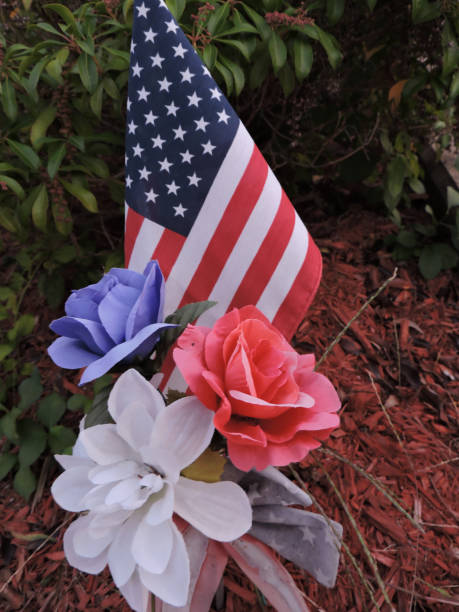 istock American Flag and Flowers 1053728608