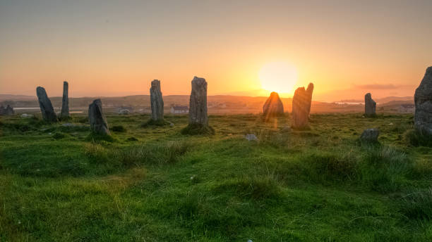 istock Sunset over the Callanish 2, circle of standing stone 1053730482