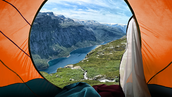 Looking out from a tent to a Mountain View