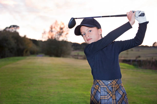 istock Junior Female Golf Swing Finish Position 1053740856