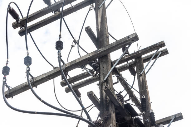 istock Electricity concept. Close up high voltage power lines station. 1053741416