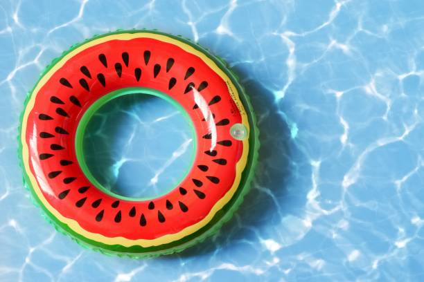 istock Close-Up Of Inflatable Ring Floating On Swimming Pool 1053749746
