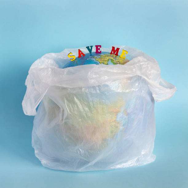 istock Save me and Model planet Earth in polyethylene plastic package 1053752060