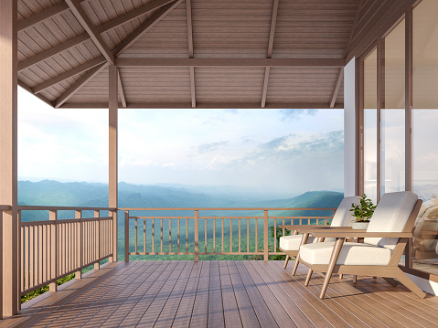 Wood house terrace with mountain 3d render, There are wood floor.Furnished with fabric and wooden furniture. There are wooden railing overlooking the surrounding nature and mountain