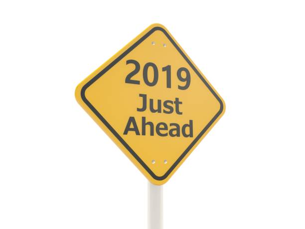 istock 2019 New year symbol on a road sign 1053758630