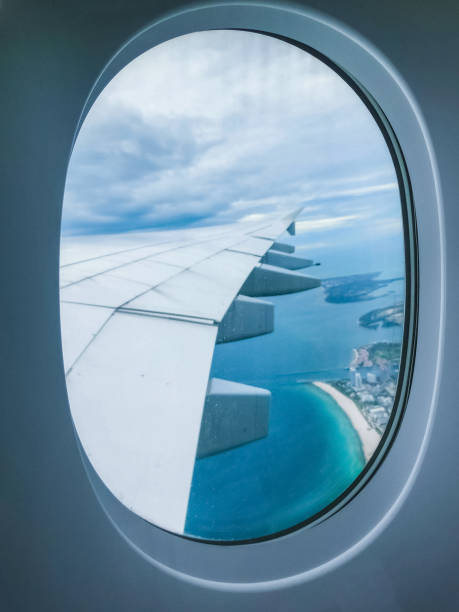 istock Miami Beach skyline from airplane porthole 1053763402