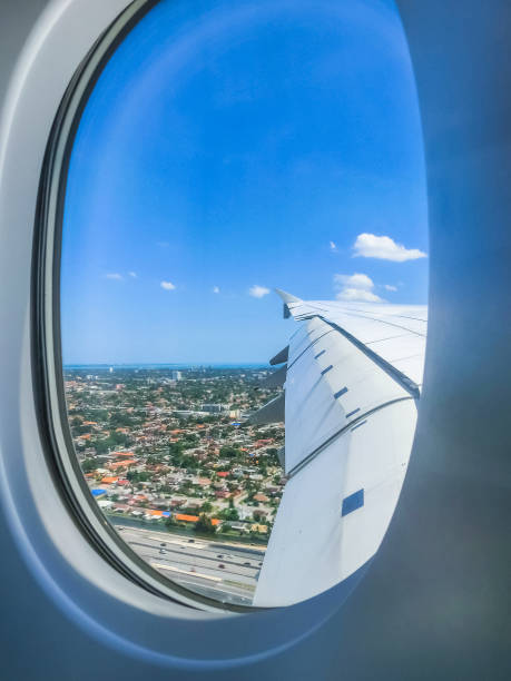 istock Miami Beach skyline from airplane porthole 1053763446