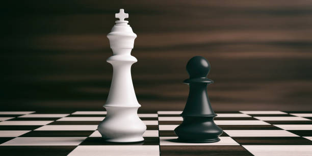 istock White chess king and black pawn on a chessboard. 3d illustration 1053768430