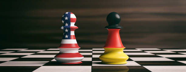 istock USA and Germany flags on chess pawns on a chessboard. 3d illustration 1053768460
