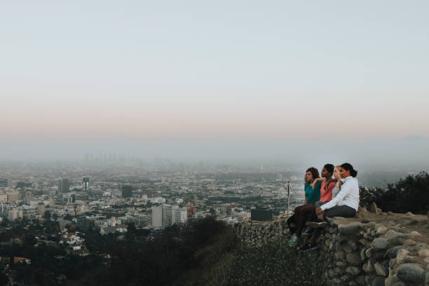 Happy friends on a hike in the hills