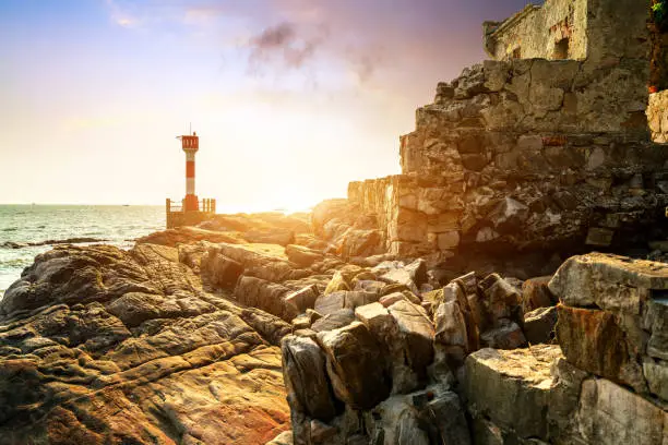 Photo of lighthouse by the sea