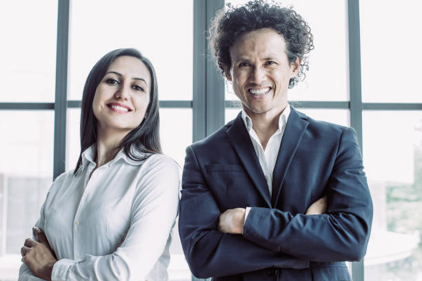 istock Happy multiethnic entrepreneurs looking at camera 1053773962